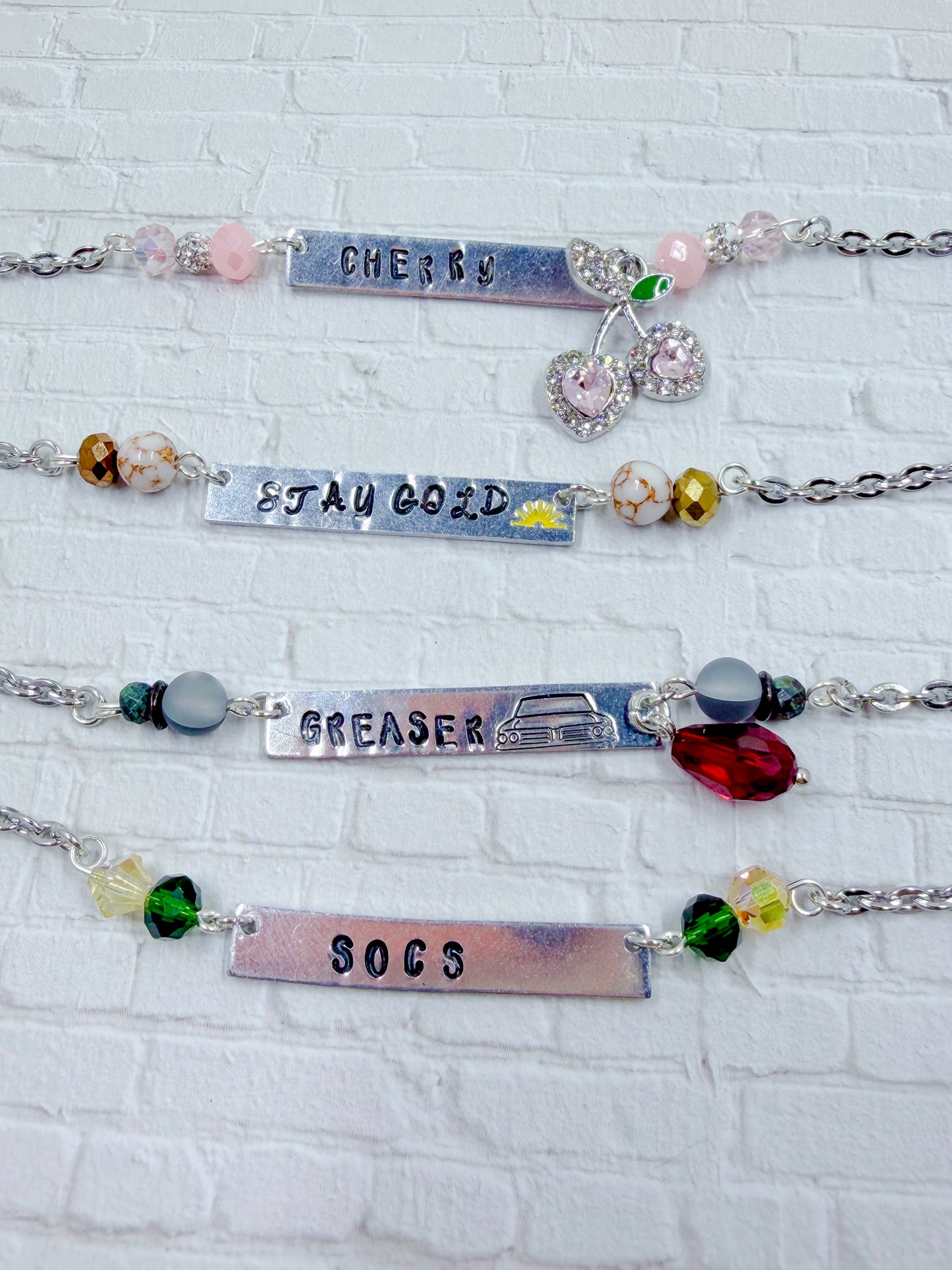 The Outsiders Stamped Necklaces