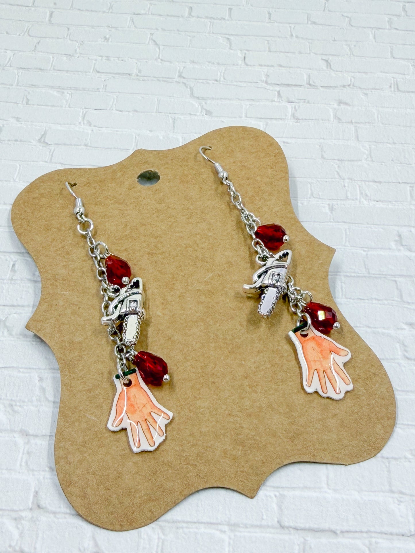 We got your Hand Ash Earrings