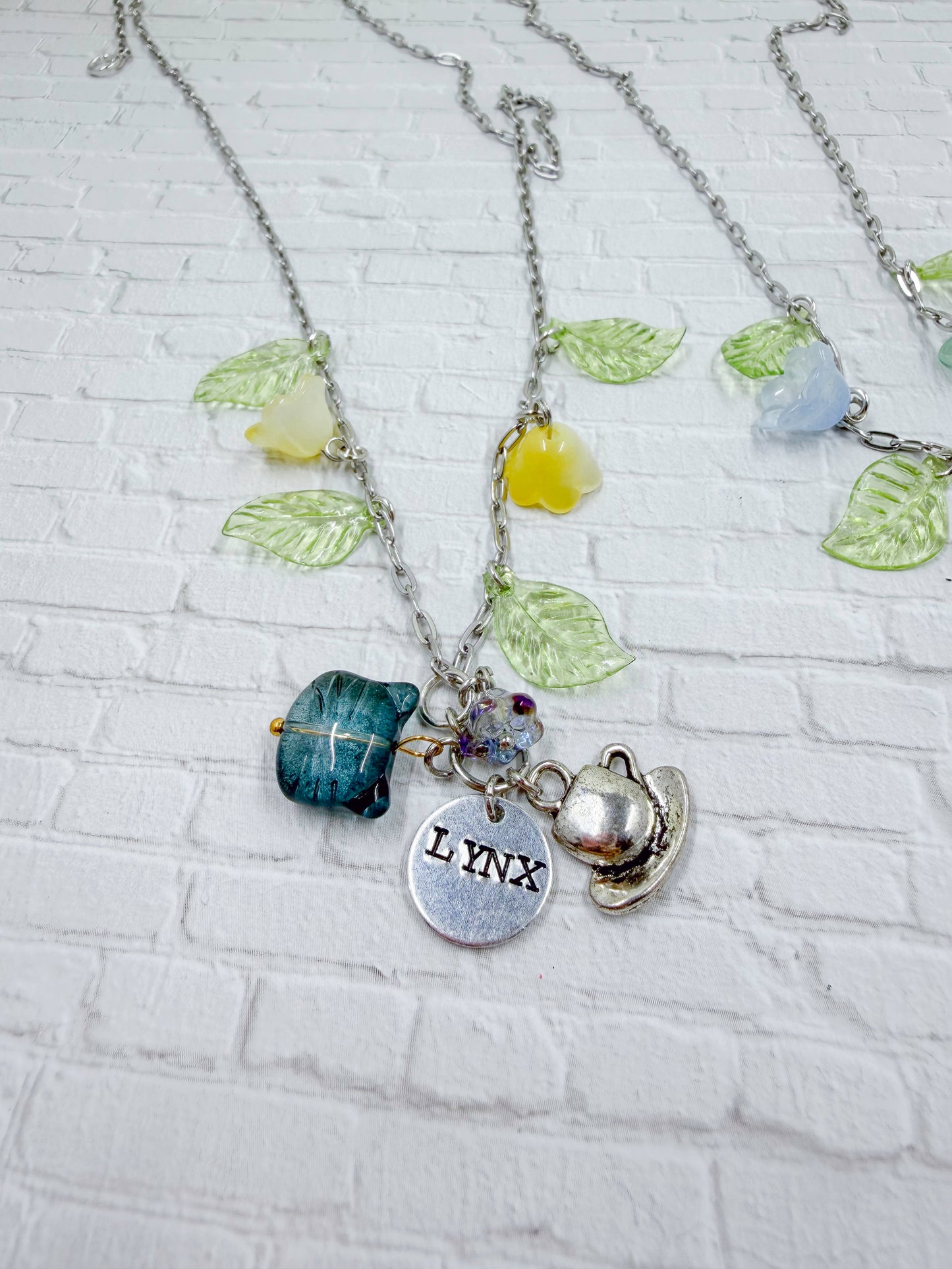Cat's For Cash Character Necklaces